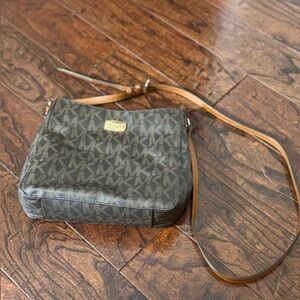 Brown Crossbody Bag. Lightly used. Small, Washable stain inside from lipgloss.